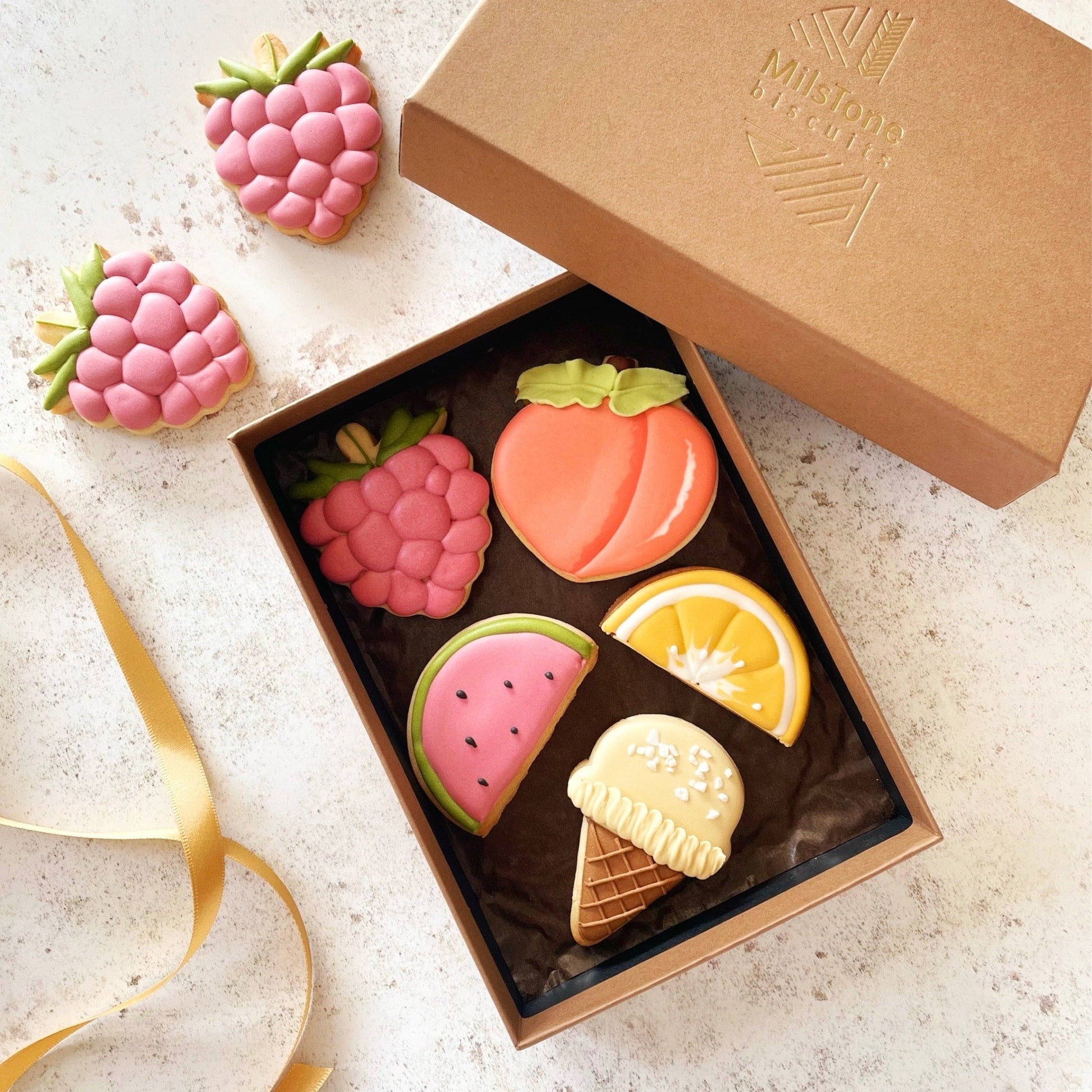 Summer Fruit Mini Iced Biscuits hand decorated, Garden Themed Biscuits hand decorated, Summer themed biscuits, Biscuit gift box, custom iced biscuits, Raspberry cookies, heart-shaped biscuits, Brighton bakery. Lemon biscuits, Fruit biscuits